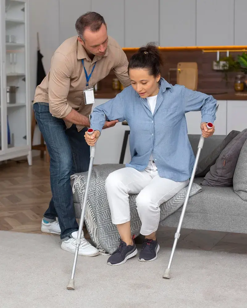 https://lowenthalabrams.com/wp-content/uploads/2026/09/full-shot-woman-with-crutches-1.webp