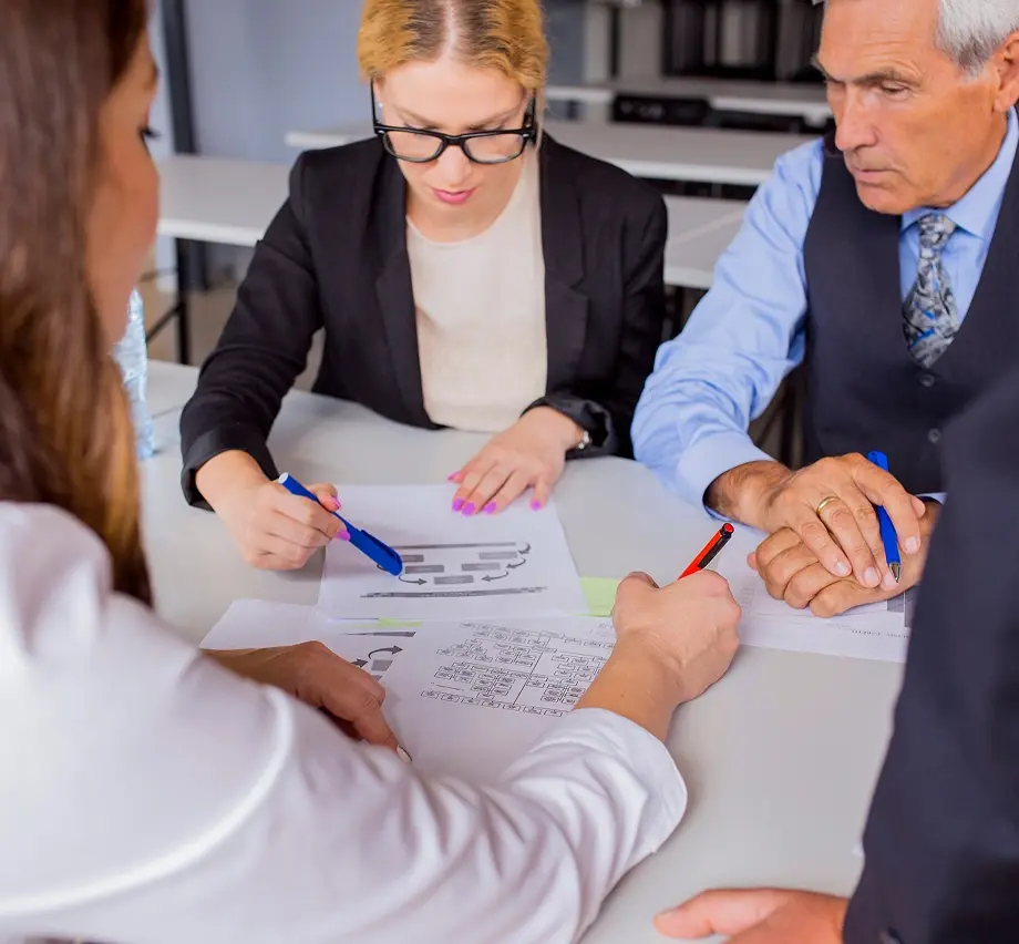 https://lowenthalabrams.com/wp-content/uploads/2026/09/group-business-people-discussing-business-plan-table-office-1.webp